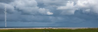  ARBEITSTITEL: Schwere Regenwolken über dem Strand von Sankt Peter-Ording Bad