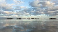  Spiegelung des Himmels im nassen Sand am Nordseestrand von  Sankt Peter-Ording
