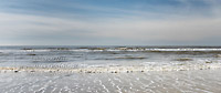  ARBEITSTITEL: Uferwellen und Horizont vor Sankt Peter-Ording an einem milden Tag im Frühling III